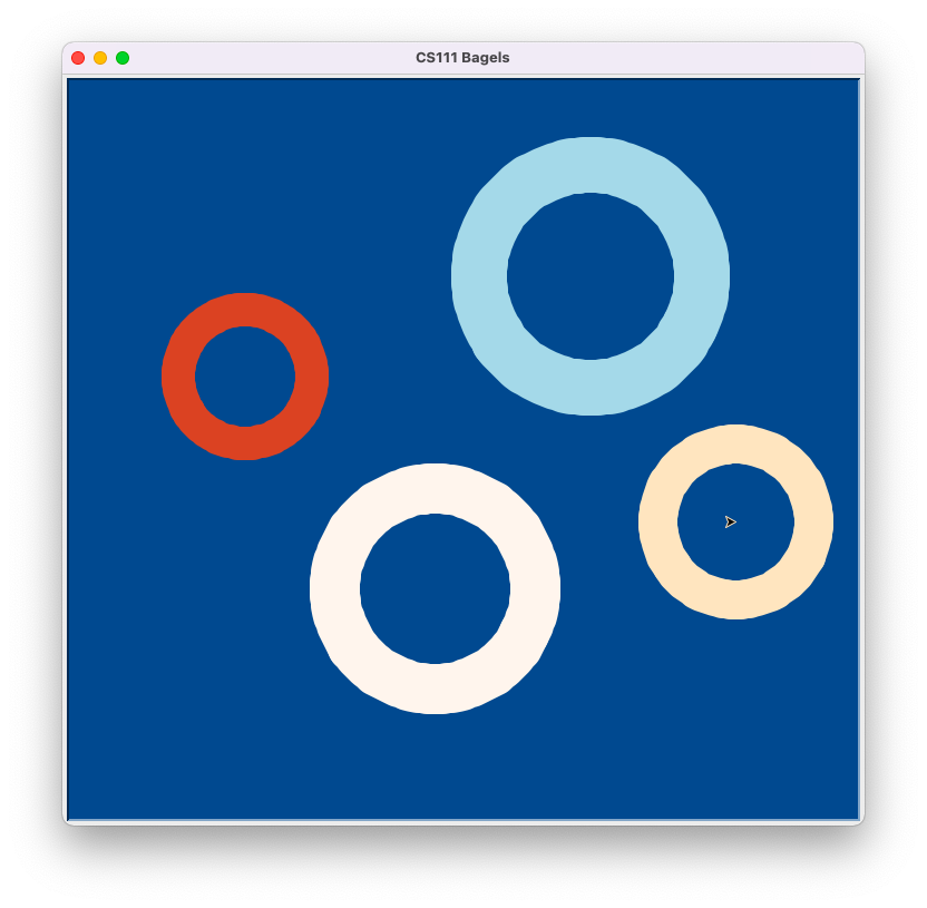Four circles on a blue background, each with a hole in the middle. Each one is a different size and color from the others.